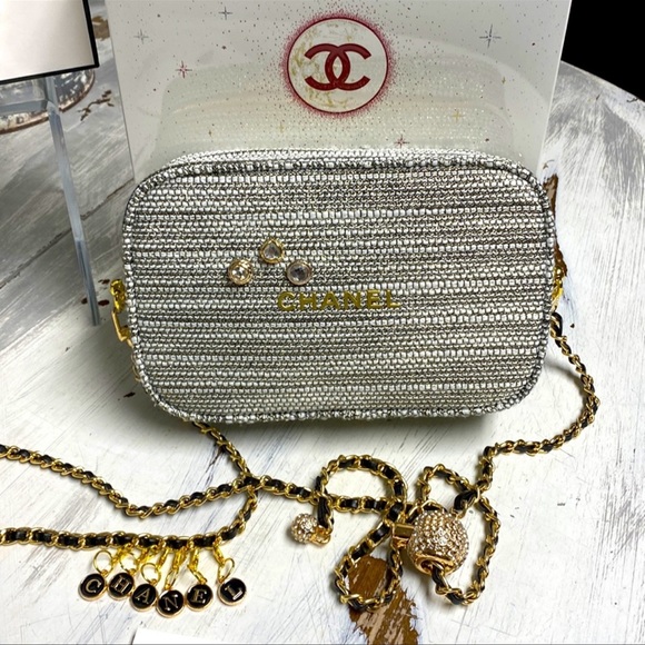 CHANEL Handbags - Chanel Tweed Pouch with Straps - Holiday Edition